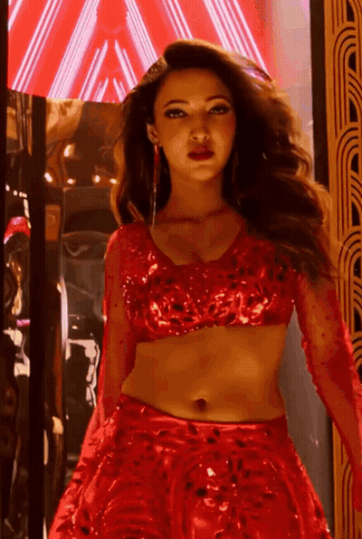 Woman In Red Crop Top And Skirt GIF