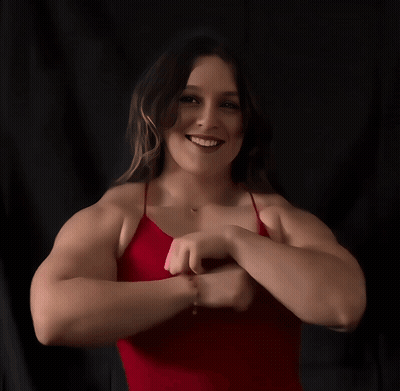 Woman In Red Dress Adjusting Bra Straps GIF