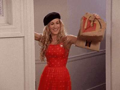 Woman In Red Dress And Black Beret Holding McDonald's Bag GIF