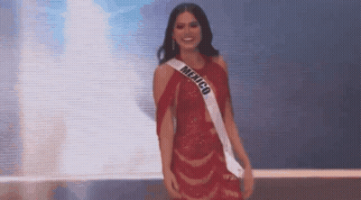 Woman In Red Dress And Mexico Sash On Stage GIF