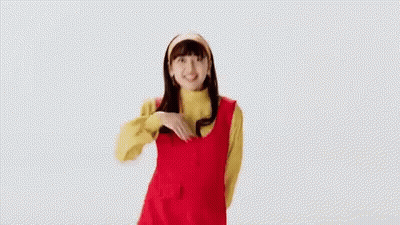Woman In Red Dress And Yellow Sweater Giving Thumbs Up GIF