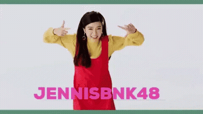 Woman In Red Dress And Yellow Sweater Holding Scissors GIF