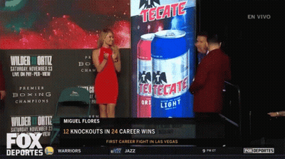 Woman In Red Dress At Tecate Sign GIF