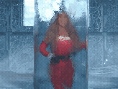 Woman In Red Dress Behind Glass Block GIF