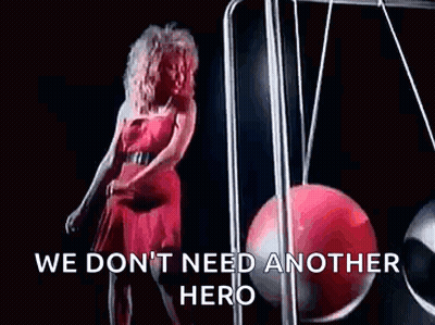 Woman In Red Dress Dancing On Swing GIF
