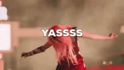 Woman In Red Dress Dancing Yasssss Sign GIF