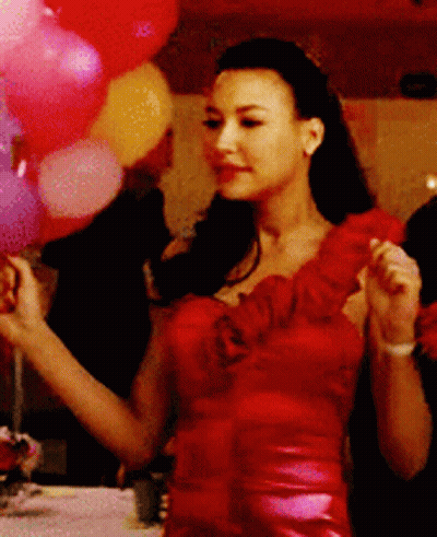 Woman In Red Dress Holding Balloons GIF