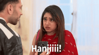 Woman In Red Dress Holding Cell Phone Says Hanjiiiii GIF