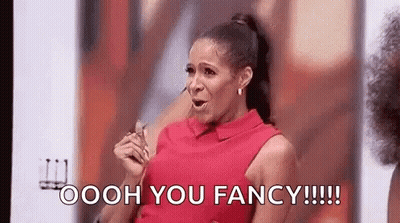 Woman In Red Dress Holding Glasses GIF