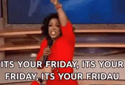 Woman In Red Dress Holding Microphone In Front Of Television GIF