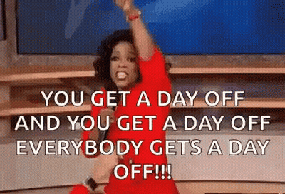 Woman In Red Dress Holding Microphone On Stage GIF