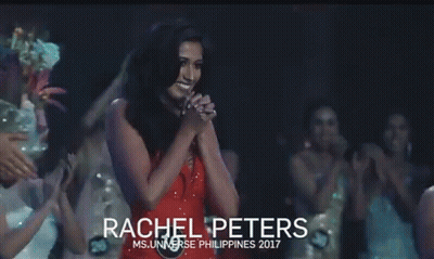 Woman In Red Dress Holding Microphone On Stage GIF