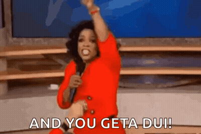 Woman In Red Dress Holding Microphone Saying And You Get A Du GIF