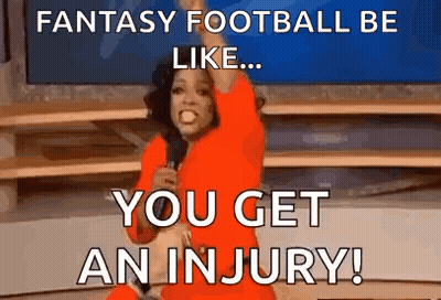 Woman In Red Dress Holding Microphone Saying Fantasy Football Be Like You Get An Injury GIF