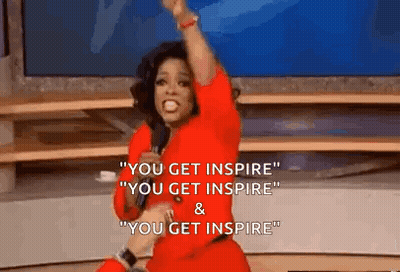 Woman In Red Dress Holding Microphone Saying Inspire GIF