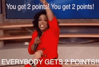 Woman In Red Dress Holding Microphone Says You Get 2 Points Everybody Gets 2 Points GIF