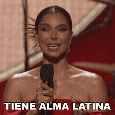 Woman In Red Dress Holding Microphone Tiene Alma Latina GIF