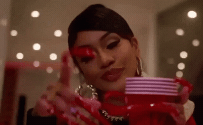 Woman In Red Dress Holding Red Cup And Heart GIF