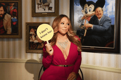 Woman In Red Dress Holding Yellow Sign Saying I Don't Know Her GIF