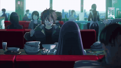 Woman In Red Dress Hugging Man In Blue Suit In Front Of Coup D'Envo Sign GIF