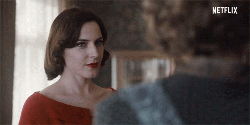 Woman In Red Dress In Front Of Netflix GIF