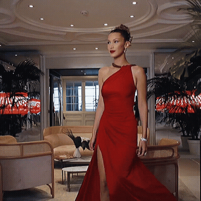 Woman In Red Dress In Room GIF