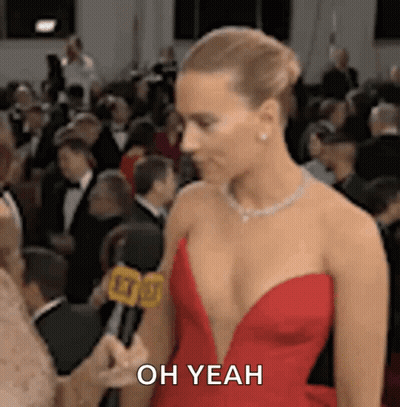 Woman In Red Dress Interviewed By Reporter Says Oh Yeah GIF