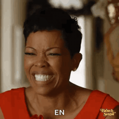 Woman In Red Dress Laughing And Saying En GIF