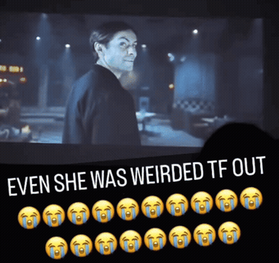 Woman In Red Dress Making Hand Gesture On Stairs GIF