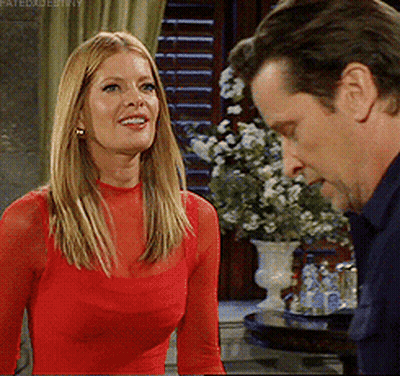 Woman In Red Dress Next To Man GIF