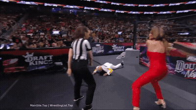 Woman In Red Dress Next To Referee GIF