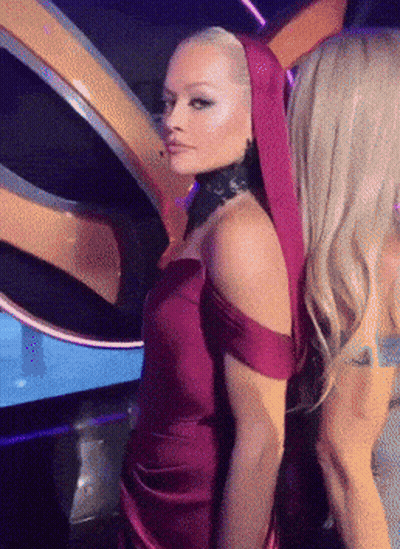 Woman In Red Dress Next To Woman In Yellow Dress GIF