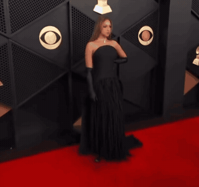 Woman In Red Dress Photographed With Vivo V5s Text GIF