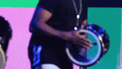 Woman in Red Dress Playing Ludwig Drums