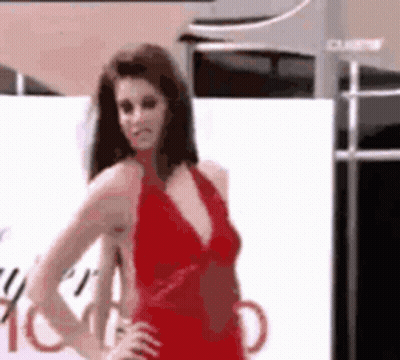 Woman In Red Dress Posing GIF