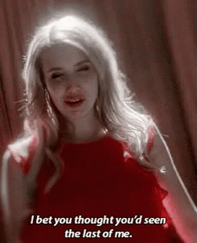 Woman In Red Dress Saying I Bet You Thought You'd Seen The Last Of Me GIF