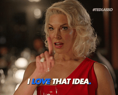 Woman In Red Dress Saying I Love That Idea With Finger GIF