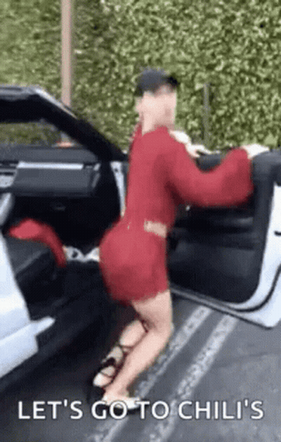 Woman In Red Dress Saying Let's Go To Chili's GIF