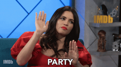 Woman In Red Dress Saying Party In Front Of IMDb Logo GIF