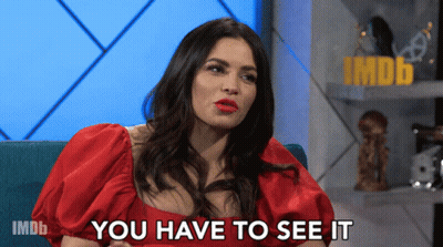 Woman In Red Dress Saying Party In Front Of IMDb Logo GIF