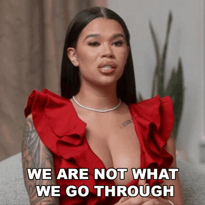 Woman In Red Dress Saying We Are Not What We Go Through GIF