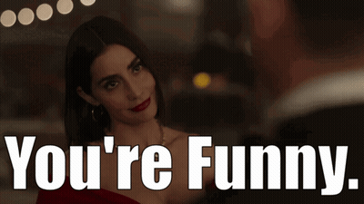 Woman In Red Dress Saying You're Funny GIF