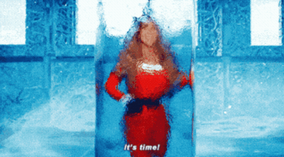 Woman in Red Dress Says It's Time in Blue Room