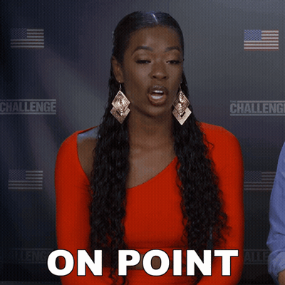 Woman In Red Dress Says On Point In Front Of Challenge Sign GIF