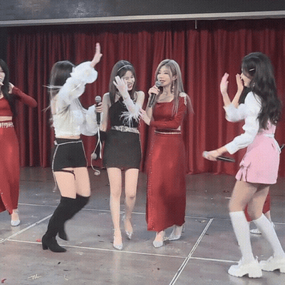 Woman In Red Dress Singing Into Microphone Dancing GIF