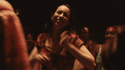Woman In Red Dress Smiling Dancing GIF