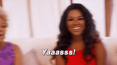 Woman In Red Dress Smiling GIF