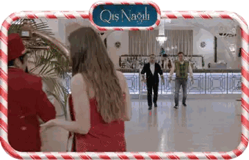 Woman In Red Dress Standing Before Qis Nagli Sign Sticker
