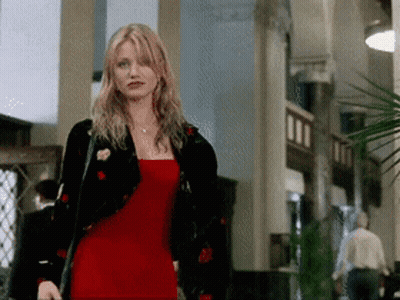 Woman In Red Dress Standing GIF