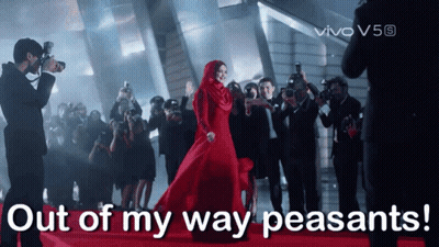 Woman In Red Dress Surrounded By Photographers Saying Out Of My Way Peasants GIF